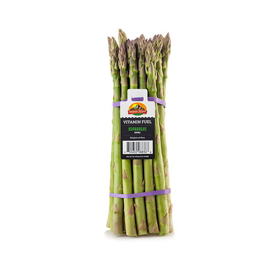 A bunch of trimmed, green asparagus banded with rubber bands and tagged with a Crystal Valley tag