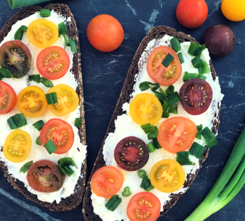 Baby Heirloom Tomatoes and Green Onion on Pumpernickel Toast